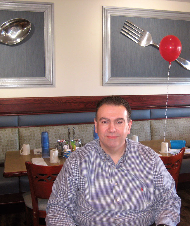 George Nikolopoulos inside his restaurant BLUEBERRY HILL CAFE at 4028 147th St Midlothian, IL.