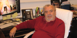 Steve Gazis, co-owner of Empress Banquets in Addison, IL, inside his office.